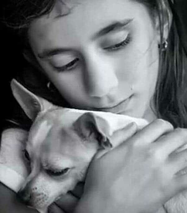 C.A.R.E.4Paws Animal Abuse Awareness black and white image of a girl comforting her dog