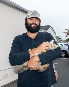 Man with full grown cat