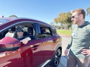 Board President, Chris Harris, visited with one of the guests at our donation drive-thru station at Earl Warren Showgrounds