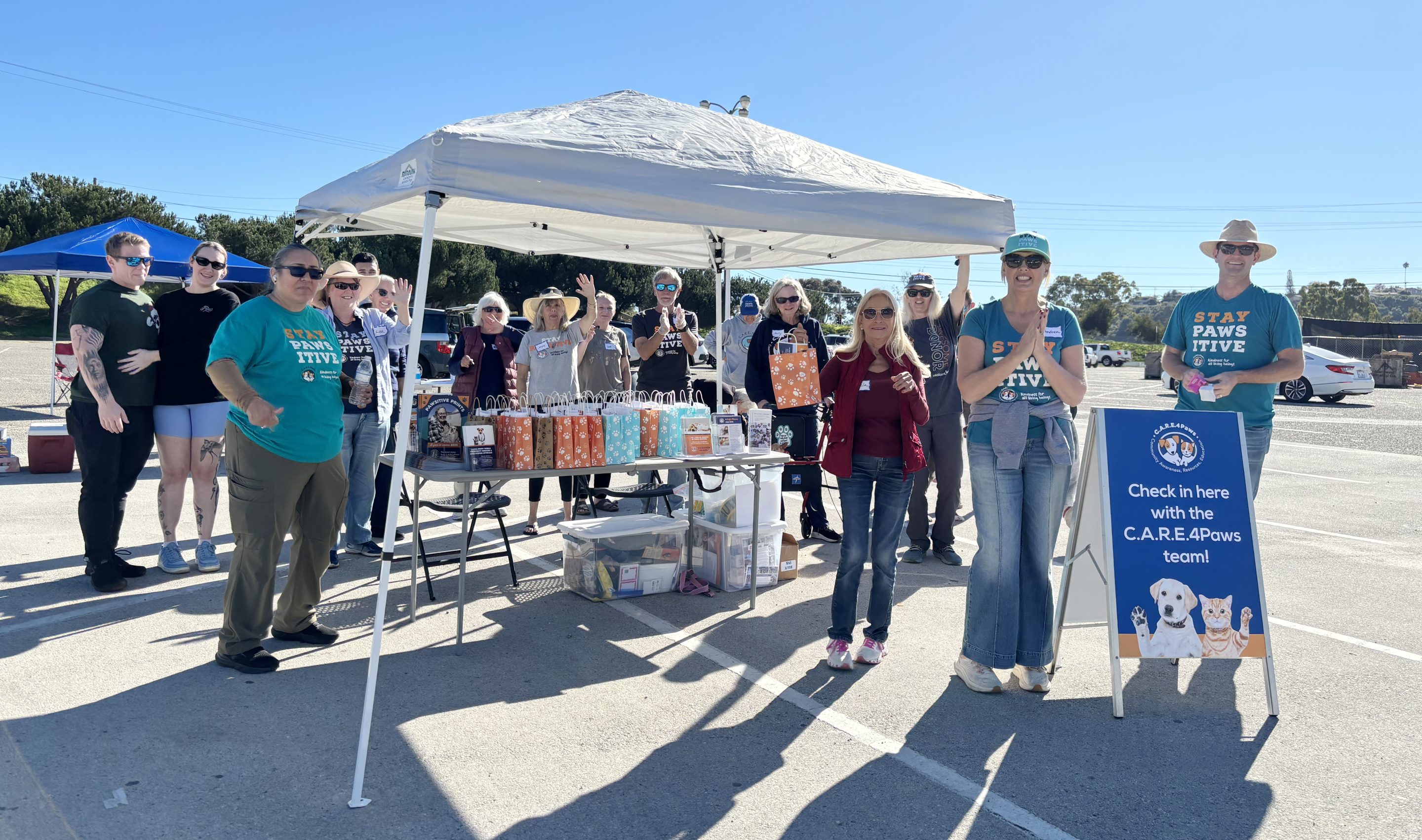 Volunteers kicking off our 2025 Howliday Drive with cow bells
