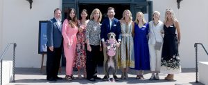 C.A.R.E.4Paws Board of Director and leadership team lining the steps of the Cabrillo Pavilion