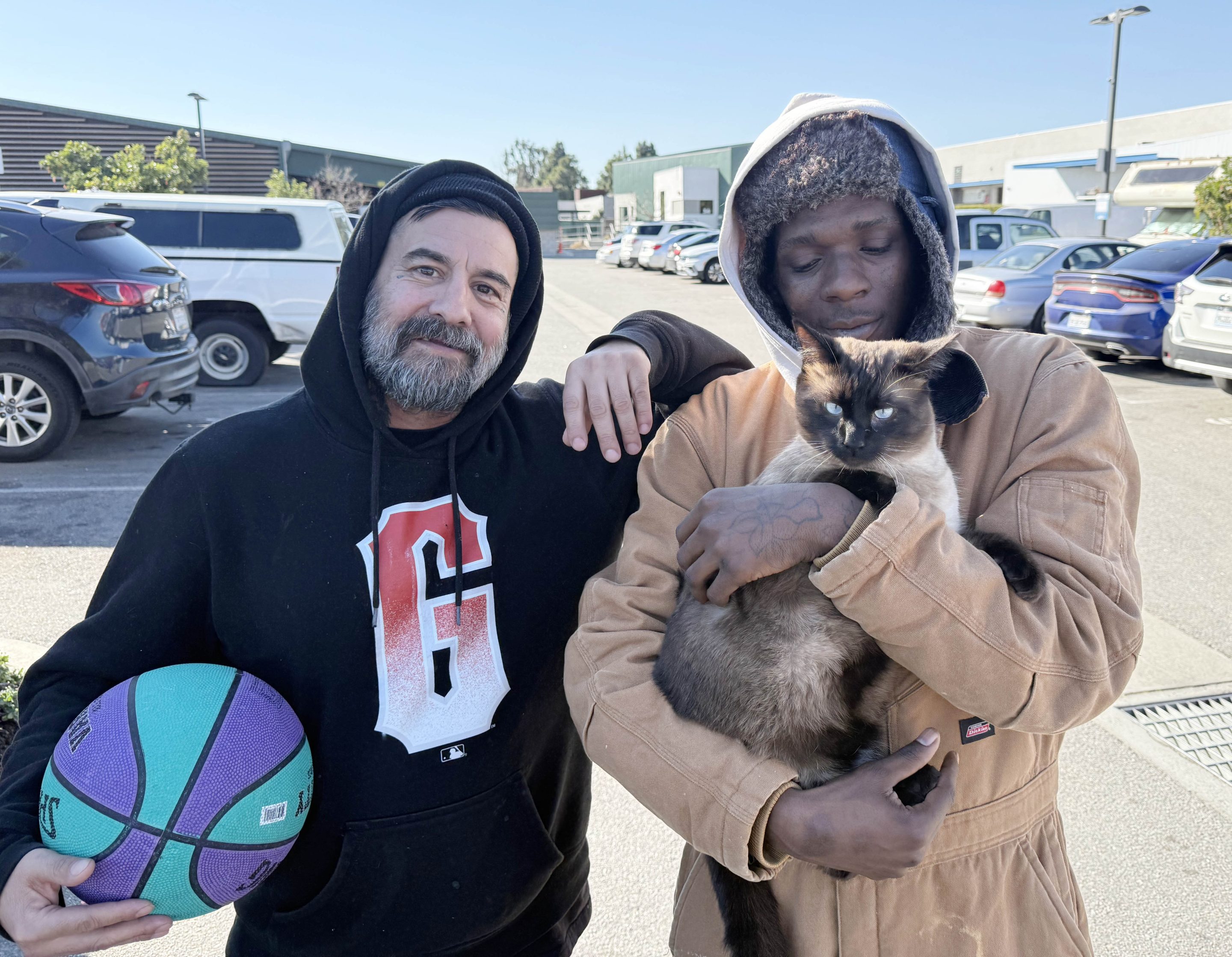 African American lady with grey kitten